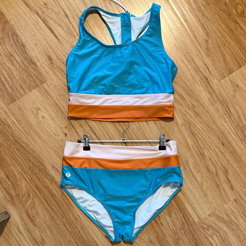 Vibrant Blue and Orange sporty two piece swimsuit. High rise bottoms.